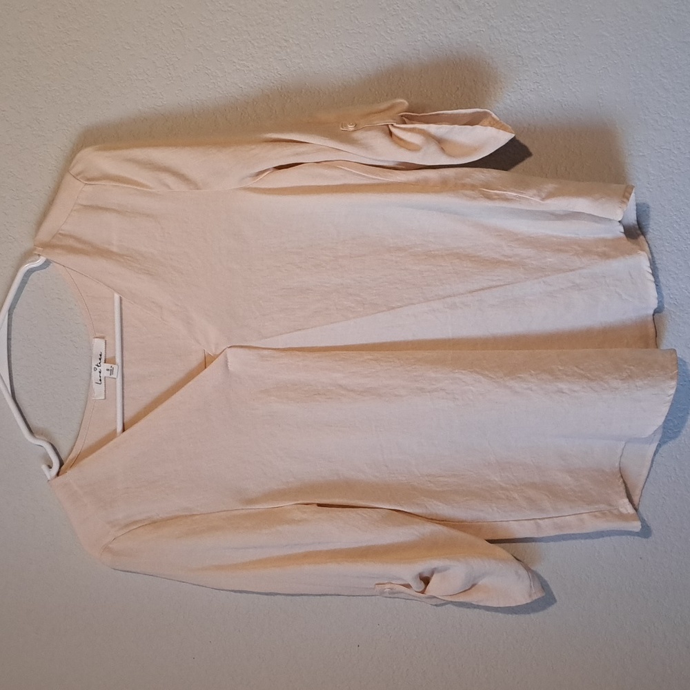 Love Tree, small beige blouse.